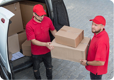 Team members loading a truck